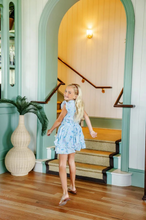 Load image into Gallery viewer, Your little lady will steal the show in the Mary Price Party Dress featuring our enchanting Little London Flowers print! This stunning dress showcases beautiful details and soft fabric that's perfect for Easter celebrations, vacations and special occasions. She'll radiate joy and confidence while twirling in this absolutely gorgeous dress all spring!