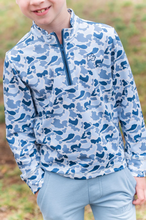 Load image into Gallery viewer, The Boys Pro Performance Blue Camo Pullover by Prodoh combines style and function with its bold blue camo print and durable performance fabric. Designed for toddlers to tween boys, this 1/4 zip pullover offers easy layering and exceptional comfort during active play. Perfect for year-round wear, it helps keep your young one warm without overheating, making it an essential addition to any kid’s wardrobe.