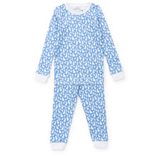 Load image into Gallery viewer, Get your toddler ready for a cozy and stylish Spring with the Grayson Pajama 2 Piece Set in Easter Time Blue from Lila & Hayes. These fun and classic pajamas feature a vibrant blue background and a charming white Easter design, perfect for the season. Give your little one a comfortable and fashionable bedtime look with this set.