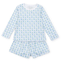 Load image into Gallery viewer, Introduce your little girl to sweet dreams with the Hampton Blooms Sophie Shorts Set from Lila & Hayes. This pajama set includes a long sleeve shirt and coordinating shorts, featuring a charming blue and green floral print on a crisp white background. Crafted with comfort and style in mind, this classic set will have her sleeping soundly.