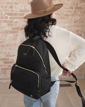 Load image into Gallery viewer, Everyone needs a trusty, everyday bag, and the Everyday Backpack from JuJuBe is here to be just that
Machine washable
11 pockets, including 2 insulated bottle pockets
Travel made easy with a trolley sleeve and removable stroller straps
Comfortable, adjustable shoulder straps
Removable stroller straps
Cushioned changing pad