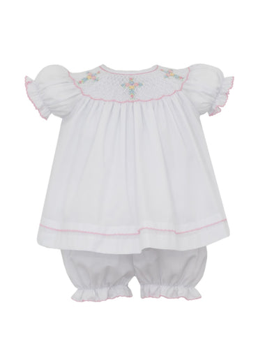 This Girl's Smocked Cross Bishop Bloomer Set by Anavini offers a sweet and elegant look with its precious white design and delicate pink trim. This design is adorned with pastel colored crosses, adding a touch of charm. Perfect for special occasions, this darling set is a must-have for any little girl's wardrobe.
