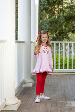 Load image into Gallery viewer, Celebrate the magic of the season with the Gingerbread House Pant Set by Trotter Street Kids. The cozy pink and white knit tee, featuring a charming gingerbread house appliqué, pairs perfectly with soft red leggings—comfort and festive style wrapped into one delightful outfit!
