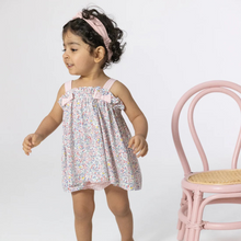 Load image into Gallery viewer, Embrace summer with the enchanting Elizabeth’s Garden Ruffled Bloomer Set by Angel Dear! This charming outfit features a vibrant floral tank top adorned with playful bows on the straps, complemented by adorable pink bloomers. Crafted for comfort and breathability, it’s the perfect choice for little ones to frolic in style and joy!
