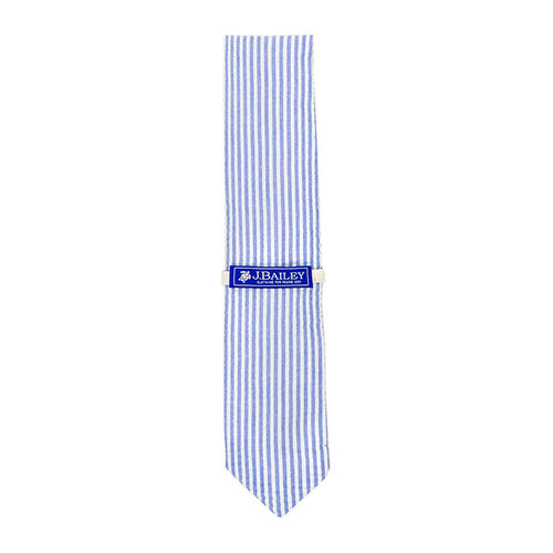 Dressing up can be a tough job, but not with this handsome Bailey Long Tie in Sailor Blue Seersucker. Featuring blue and white vertical stripes, this mini-sized tie is ready for any smart occasion with your little one.

Bailey Tie Sizing:

Small 42