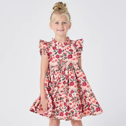 Fresh As A Daisy! A patch of wild daisies in shades of red, orange and white springs from a blush colored ground in our Pink Daisy Floral shown here on our Girls Jennifer Dress. This short sleeve flock favorite silhouette delights with its feminine ruffled neck and sleeves and fully gathered, two tiered skirt that spins like a dream. Invisible zipper. A silver thread woven throughout adds a touch of shimmer and shine. Match back to Little Sis in our Baby Girls Jennifer Bubble. 