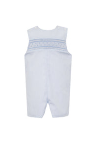Transform your little boy into a dapper young man with Petit Bebe's Boy's Smocked Light Blue Striped Jon Jon. The classic blue and white stripe design, complete with smocked detailing, exudes charm and sophistication. Pair it with the white piped peter pan shirt for a complete, polished look! Matching infant boy's bubble for a picture perfect sibling set!