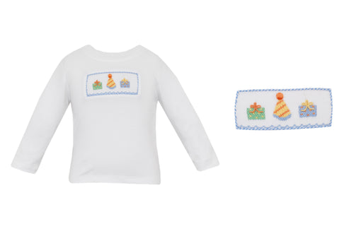 Celebrate your little one’s special day in style with the Boy's Birthday Smocked Long Sleeve T-Shirt by Petit Bebe. This charming t-shirt is adorned with a delicate smocking and embroidered birthday hats and gifts detail. Ideal for making your infant boy's birthday truly unforgettable! Pairs with the Blue Gingham Pants for a pulled together birthday look!