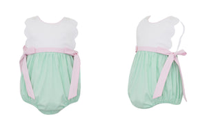 Upgrade your little girl's wardrobe with our Girls Scalloped Gingham Sunbubble from petit bebe! This adorable piece features a mini check green &amp; white bottom and a white top, adorned with stunning pink gingham side ties. Perfect for monogramming, this sunbubble is both stylish and practical!