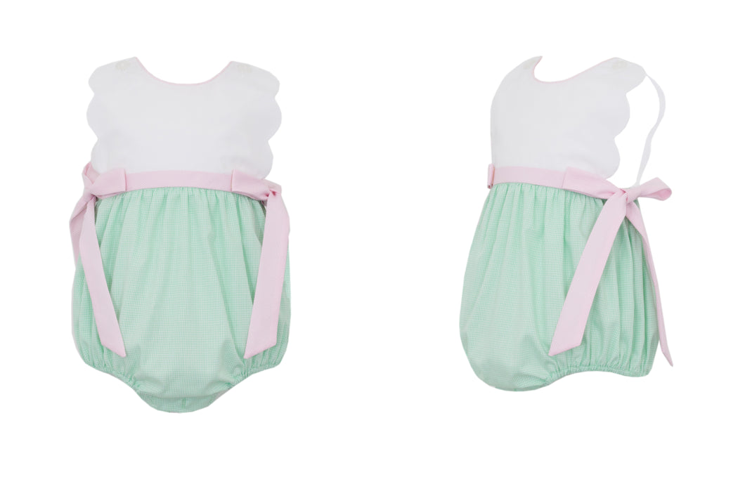 Upgrade your little girl's wardrobe with our Girls Scalloped Gingham Sunbubble from petit bebe! This adorable piece features a mini check green & white bottom and a white top, adorned with stunning pink gingham side ties. Perfect for monogramming, this sunbubble is both stylish and practical!