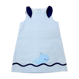 This enchanting Girl's Eloise Seersucker Whale Dress combines timeless blue and white seersucker fabric with a charming whale applique that's sure to make a splash. Perfect for summer gatherings, beach outings, or special occasions, this playful yet elegant dress from Zuccini Kids will keep your little one cool, comfortable, and utterly adorable all season long.