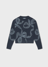 Load image into Gallery viewer, Girls Navy Bow Detail Sweater from Mayoral brings timeless elegance with a contemporary silhouette. The classic navy hue pairs effortlessly with any outfit, while the charming bow detail adds a touch of personality and sophistication. Crafted for comfort and style, this sweater is designed to become a wardrobe favorite she'll reach for again and again.
