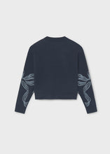 Load image into Gallery viewer, Girls Navy Bow Detail Sweater from Mayoral brings timeless elegance with a contemporary silhouette. The classic navy hue pairs effortlessly with any outfit, while the charming bow detail adds a touch of personality and sophistication. Crafted for comfort and style, this sweater is designed to become a wardrobe favorite she'll reach for again and again.
