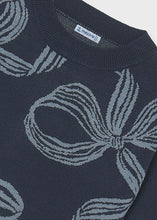 Load image into Gallery viewer, Girls Navy Bow Detail Sweater from Mayoral brings timeless elegance with a contemporary silhouette. The classic navy hue pairs effortlessly with any outfit, while the charming bow detail adds a touch of personality and sophistication. Crafted for comfort and style, this sweater is designed to become a wardrobe favorite she'll reach for again and again.
