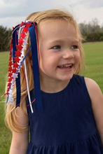 Load image into Gallery viewer, Full of patriotic spirit and cheer-ready style, this linen bow features a bold red, white, and blue ric-rac layer atop a crisp linen underlay. It’s a standout look for parades, parties, team events, and every star-spangled celebration of the season. This bow is sure to stay in her hair all day with the patented WeeStay™ no-slip hair clip.
