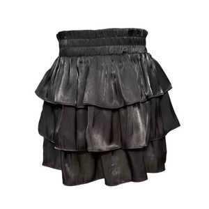 The Luna Skirt in Black Shimmer from Pleat offers a dazzling tiered design that adds sparkle to every step. Perfectly crafted for tween girls, this skirt pairs effortlessly with the striped Oliva Flutter Top or any Pleat shirt, creating a stylish and versatile outfit. Its shimmering fabric makes it ideal for special occasions or everyday wear, giving your child a confident and playful look.