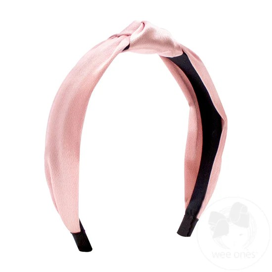 Elevate your little girl's look with our Satin Knot Wrapped Headband. Made with soft satin, it adds a touch of glamour to any fall or winter outfit. Dress up or down, this headband is the perfect accessory for any occasion.