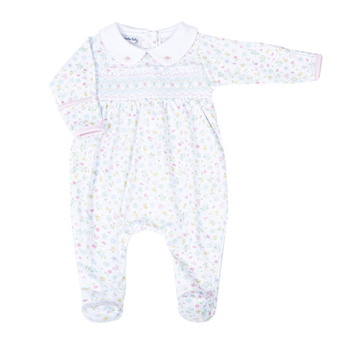 Treat your little one to ultimate comfort with Clara's Classics Smocked Collared Footie Pajamas. Made by Magnolia Baby, these adorable footie pajamas feature a delicate floral print and smocking detail, perfect for infant girls. Give her the sweetest sleep in these cozy, stylish pajamas.