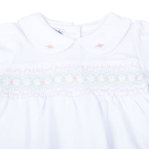 Clara's Classics Smocked Collared Tunic Set - the perfect outfit for your little one's wardrobe. This delicate white tunic features a beautiful smocked design and is paired with matching floral print leggings. From outings to special occasions, your little girl will look adorable and feel comfortable in this Magnolia Baby set.