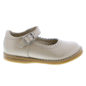 Make every step comfortable with Footmates Allie Mary Jane. Featuring an adjustable hook-and-loop strap and Custom Fit System with two interchangeable insoles for a perfect fit. The scalloped detail adds a sweet touch to this simple loafer.