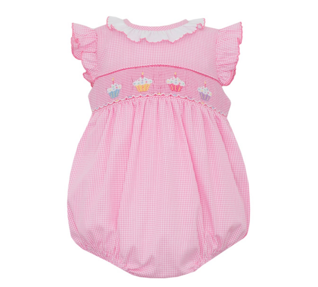 Get ready to celebrate your little one's special day with our Infant Girl's Cupcake Sunbubble! This adorable sunbubble by Petit Bebe features a charming pink and white gingham design. The precious cupcake stitching adds a sweet touch to this must-have outfit!