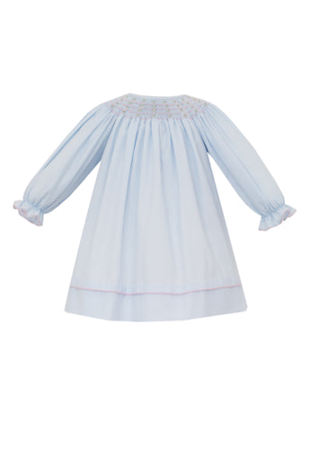 Girls Kaylee Bishop Long Sleeve Dress from Ananvini combines timeless style with delicate craftsmanship. Its smocked neckline, adorned with hand-embroidered details, adds a charming, personalized touch. The classic blue hue and long sleeves make it an elegant choice for family photos or special occasions, ensuring your little one looks picture-perfect while staying comfortable.