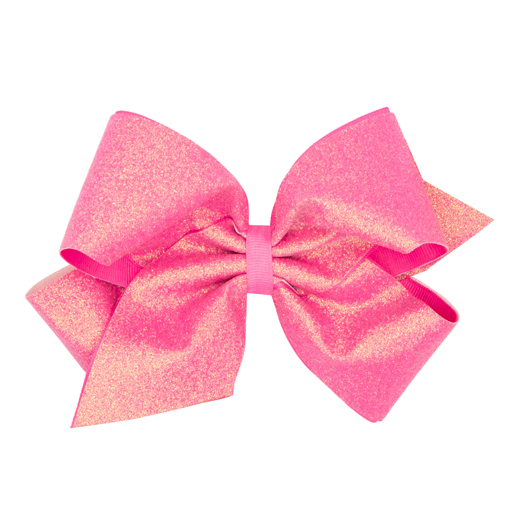 Wee Ones hair bows are bright, colorful and fun!  

The company has just celebrated their 42nd anniversary, so they obviously know the bow business!  They give children the opportunity to express themselves and complement their fashion choice at the same time!  

Each bow comes with a clip that is easy for your little lady to use on her own to encourage independence.

This king bow is made from party glitter and grosgrain ribbon overlay.  It is a beautiful, high quality bow that is great for any occasion.  