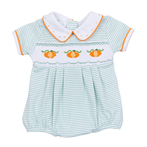 Dress your little one in cozy fall charm with the Lil' Pumpkin Classics Smocked Short Sleeve Boy Bubble in Celery by Magnolia Baby. This adorable infant boy bubble features delicate smocking, embroidered pumpkin accents, and a timeless collar that blends classic style with comfortable wear. Perfect for autumn days, it’s an easy way to keep your baby boy looking sweet and seasonally dressed.