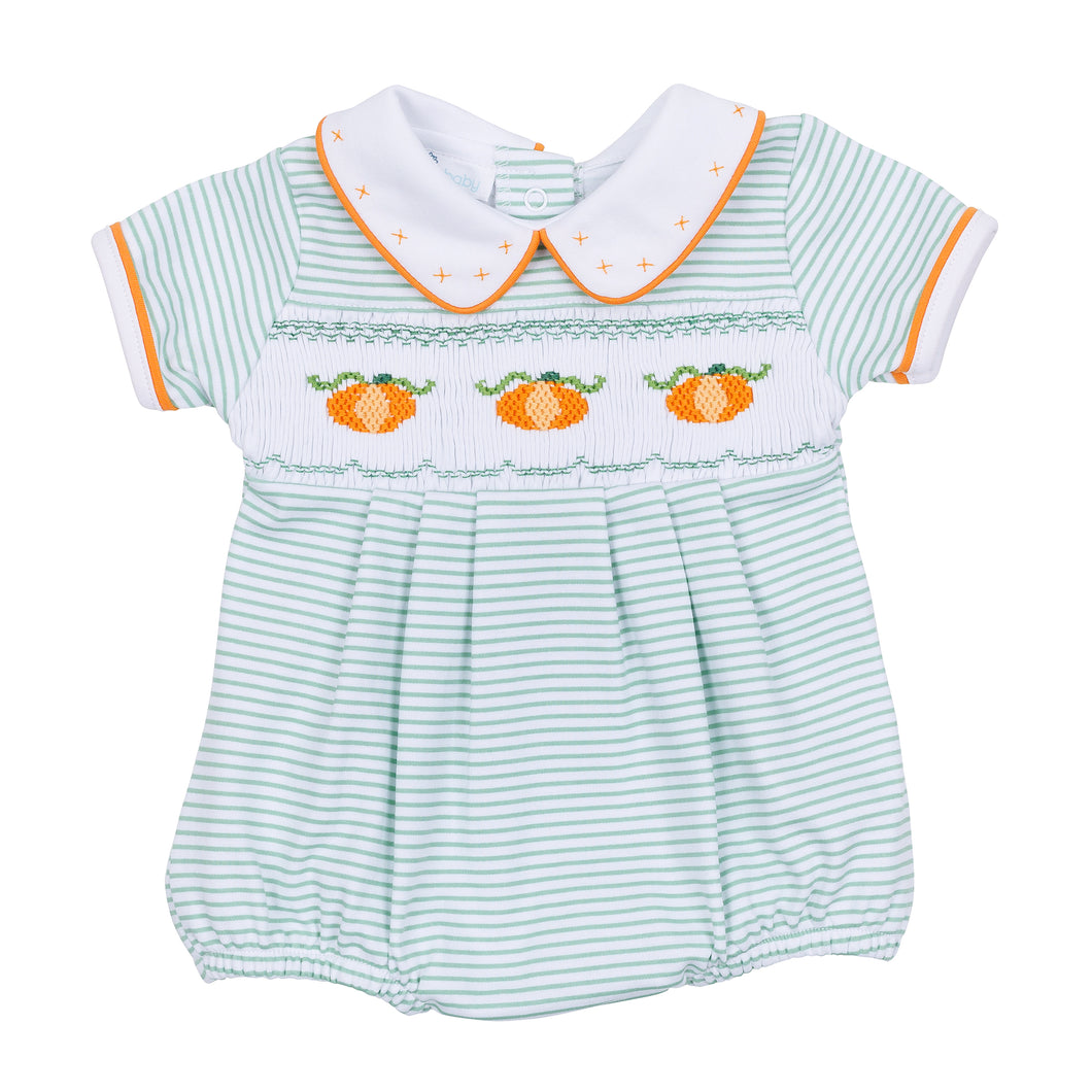 Dress your little one in cozy fall charm with the Lil' Pumpkin Classics Smocked Short Sleeve Boy Bubble in Celery by Magnolia Baby. This adorable infant boy bubble features delicate smocking, embroidered pumpkin accents, and a timeless collar that blends classic style with comfortable wear. Perfect for autumn days, it’s an easy way to keep your baby boy looking sweet and seasonally dressed.