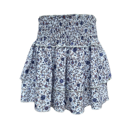 The Scottie Skirt Forget Me Nots Blue features a charming tiered design with a delicate floral print and a comfortable gathered waist. This knee-length skirt pairs effortlessly with Pleat Fall shirts to create a playful and stylish outfit perfect for tween girls ready to enjoy any event. Its light, airy fabric ensures comfort while keeping your child looking fresh and fun all day long.