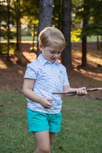 Load image into Gallery viewer, No matter the adventure, your boys will be ready in these fast-drying, UV-protective,&nbsp;boys&#39; short-sleeve pro performance polo shirts in Fish Print on White. Our boys&#39; polos keep moisture out with wicking technology, breathable fabric, and the signature vented back. PRODOH polo shirts are perfect for golf, tennis, country clubbing, or cruising the coast.&nbsp;

UPF 50 95% Polyester 5% Lycra
100% Polyester Mesh Liner
Collar Interfacing for Structure
3 Button Placket/Extra Button Included
Vented Back
Mach
