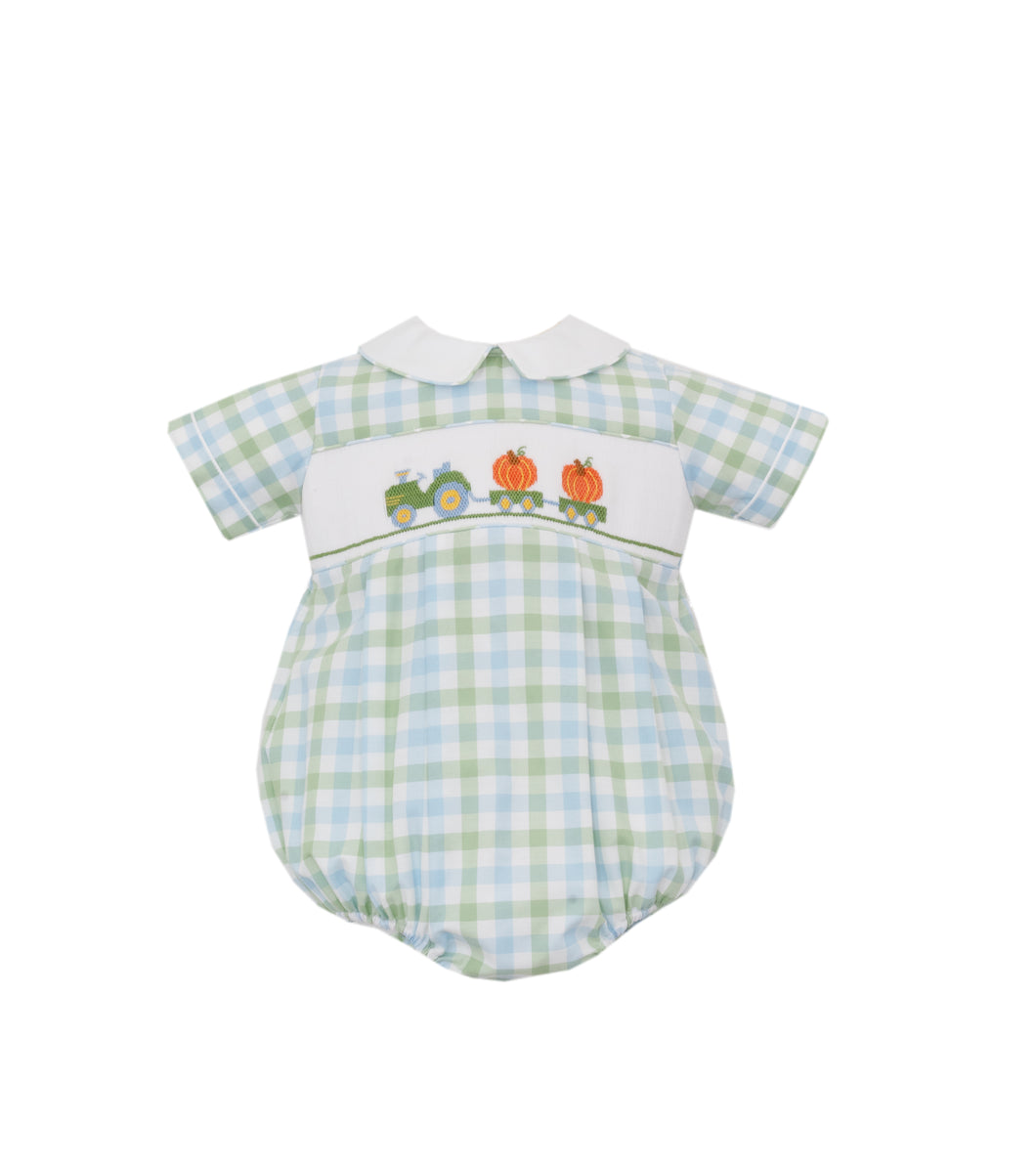 Dress your little one in charming fall style with the Boy's Pumpkin Short Sleeve Gingham Bubble by Anavini. This collared bubble features a classic green, white, and blue gingham pattern, enhanced by delightful smocked detailing with tractor and pumpkin embroidery. Perfect for cozy autumn days, this playful outfit combines comfort and seasonal charm to make every moment memorable.