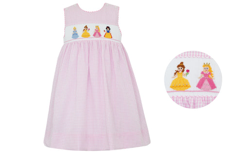 Indulge your beloved toddler with our Princess Smocked Pink Gingham Dress! Featuring a classic pink gingham print with a smocked bodice adorned with beloved princesses, this dress is perfect for special events from now until the end of summer. Light, airy sleeves add the perfect touch of sweetness.