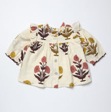 Load image into Gallery viewer, Pink Chicken’s Girls Kalani Button Up Top in Harvest Dandelion brings a fresh, cream-colored canvas alive with a vibrant multicolored block print. This charming blouse, designed for tween girls, adds effortless style and pairs beautifully with jeans for a confident, radiant look.
