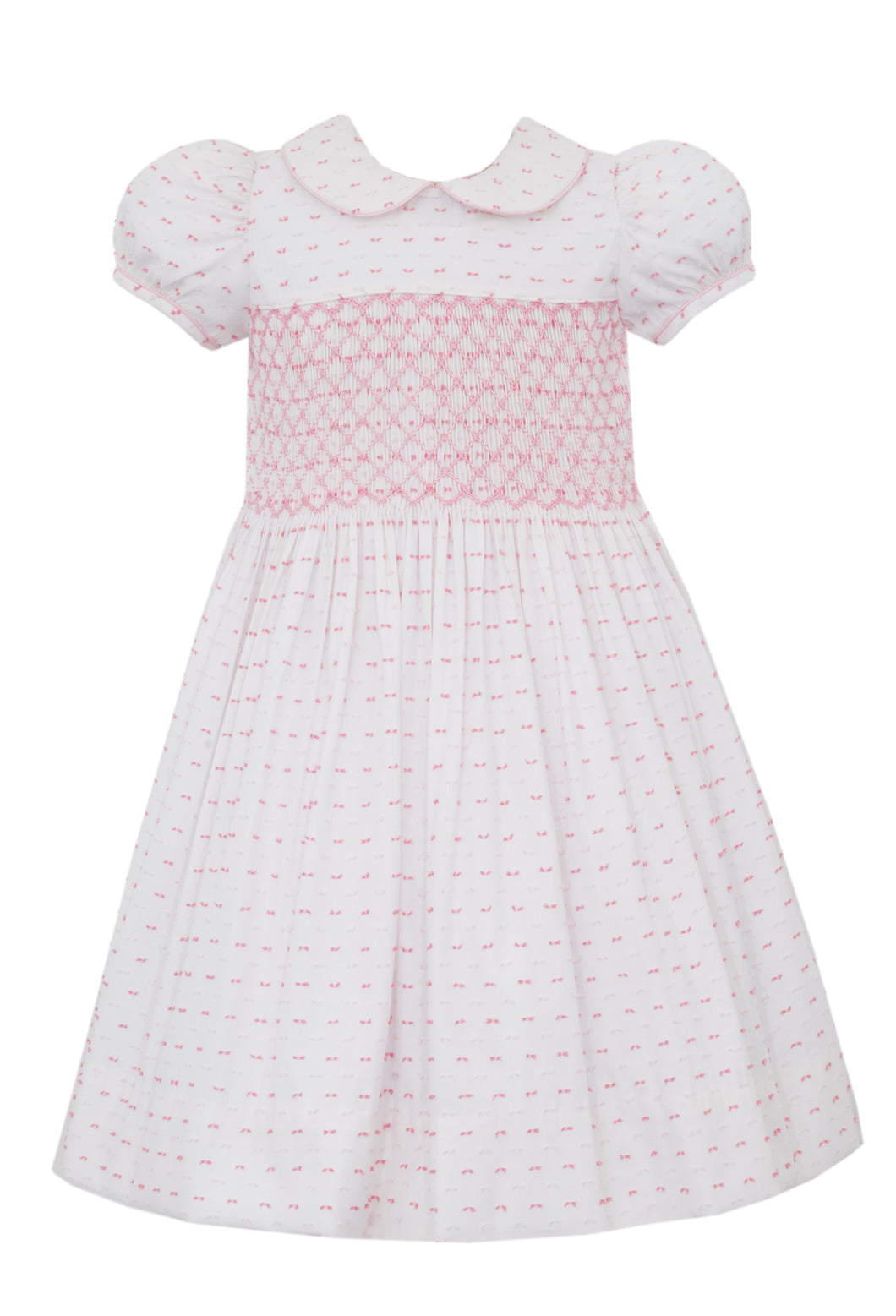 Elevate your little girl's summer wardrobe with our Girls Pink & White Dotted Plumeti Dress. With a smocked bodice and delicate hot pink dots on a crisp white background, this dress exudes timeless style and charm. Perfect for any occasion, its classic plumeti fabric is sure to make her stand out.