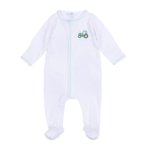 Dress your little one in comfort and charm with the Lil' Green Tractor Embroidered Footie from Magnolia Baby. This soft white footie features convenient snaps for easy changes and delicate green stitching that highlights a playful embroidered tractor on the front. Perfect for everyday wear, it combines practicality with adorable style to keep your baby cozy and looking cute all day long.