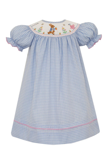 Effortlessly sweet and charming, the Peter Rabbit Bishop Dress by Anavini features a classic blue and white gingham pattern with delicate pink accents and a darling peter rabbit smocking. Perfect for any occasion, this dress will make your little one feel like a storybook character come to life!