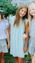 Load image into Gallery viewer, Radiate elegance and grace with our Lottie Dress in Mist from Pleat. Made with a chiffon-like fabric, smocked bodice, and ruffle cap sleeves, this dress is perfect for tween girls. Whether it&#39;s a special event or a day out, this versatile dress will have you looking and feeling your best.
