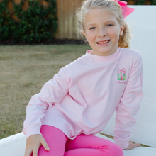 Load image into Gallery viewer, With its charming Santa Tree design, this girls pink long sleeved t shirt will make you look festive. Because it is composed of warm and breathable cotton, it is ideal for cold days that are full of joyous celebrations. This t-shirt adds charm and coziness to any gathering, whether it&#39;s a family get together or a classroom party.
