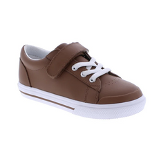 Load image into Gallery viewer, Footmates Reese Brown Leather Sneaker- Leather blucher oxford vulcanized sneaker featuring hook-and-loop closure and decorative elasticized false-laces.
Custom Fit System – Removable,&nbsp;dual&nbsp;insoles in Medium and Wide provided for customized fitting.
Roomy Toe Box – Allows tiny toes room to breathe and splay naturally during walking, enhancing balance and reducing rubbing, friction, and moisture.
Arch Support – Shoe last and insole designed to provide proper arch support for developing feet.
Firm He
