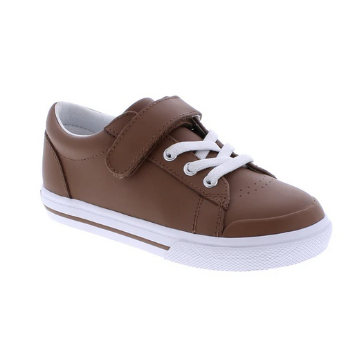 Footmates Reese Brown Leather Sneaker- Leather blucher oxford vulcanized sneaker featuring hook-and-loop closure and decorative elasticized false-laces.
Custom Fit System – Removable, dual insoles in Medium and Wide provided for customized fitting.
Roomy Toe Box – Allows tiny toes room to breathe and splay naturally during walking, enhancing balance and reducing rubbing, friction, and moisture.
Arch Support – Shoe last and insole designed to provide proper arch support for developing feet.
Firm He