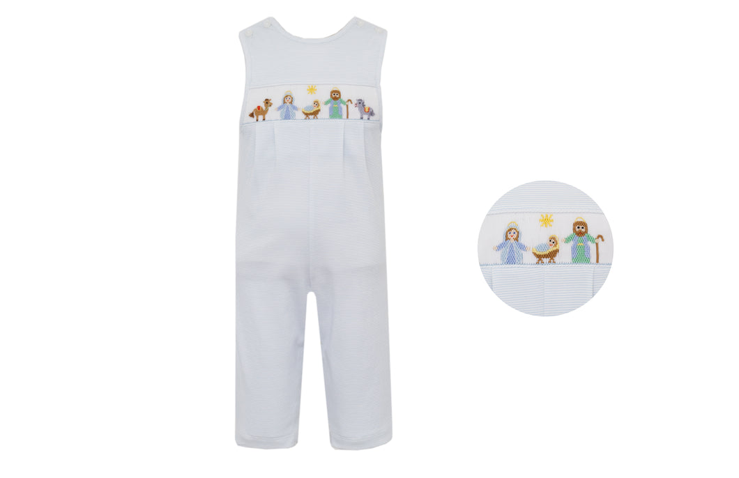 Celebrate the season in timeless elegance with this charming Boy's Knit Blue Stripe Nativity Jon Jon from Petit Bebe. Crafted in soft light blue and white mini stripes and exquisite hand-embroidered nativity scene across the bodice. Each stitch tells a story of holiday tradition, as long pants provide warmth for festive gatherings, making this the ideal choice for creating lasting memories in classic holiday style. Pair with a peter pan collar tee. 