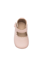 Load image into Gallery viewer, These adorable Mary Jane shoes combine style and comfort for your little one. Featuring soft construction with scalloped edges, extra cushioning in the leather insole, and a breathable lining to keep feet cozy. The supple, natural sheepskin lining adds a luxurious touch. The hook-and-loop strap with a decorative pearled button ensures easy wear. Flexible soles offer support and grip, with a classic Elephantito paw design on the rubber soles.

Soft construction with scalloped edges
Extra cushioning in leathe
