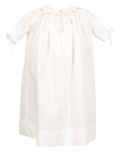 Load image into Gallery viewer, Introducing the Adeline heirloom baby daygown - a timeless classic for your newest little arrival. Designed to create cherished memories for generations to come. Made with premium 100% Egyptian cotton woven fabric. The delicate hand embroidered details of hand smocking, pink, blue and yellow woven pastel florals, and silk satin ribbon ties makes this gown the perfect choice for any occasion. Comes with diaper cover.
