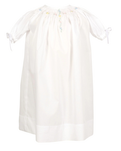 Introducing the Adeline heirloom baby daygown - a timeless classic for your newest little arrival. Designed to create cherished memories for generations to come. Made with premium 100% Egyptian cotton woven fabric. The delicate hand embroidered details of hand smocking, pink, blue and yellow woven pastel florals, and silk satin ribbon ties makes this gown the perfect choice for any occasion. Comes with diaper cover.