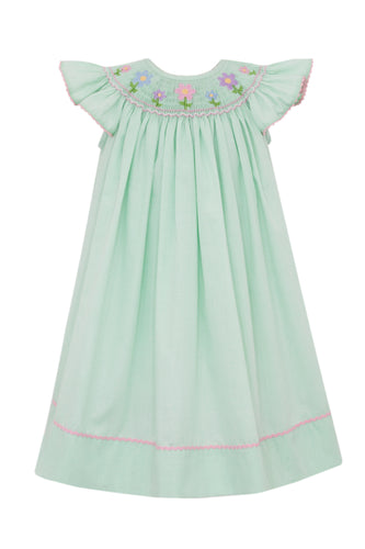 This charming Girl's Flower Green Gingham Bishop Dress by Anavini combines timeless style with delicate details. The green and white gingham pattern is perfectly complemented by a smocked bishop collar adorned with embroidered flowers, adding a touch of elegance. Cap angel sleeves enhance its sweet, classic look, making it ideal for toddler girls. Perfect for special occasions or everyday wear, this dress offers both comfort and style your little one will love.