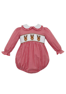 Get your little one ready for the holiday season with our Girl's Red Reindeer Gingham Bubble! This adorable long sleeve bubble features a peter pan collar and smocked design with playful reindeer accents, making it perfect for any festive occasion this season. Made by Anavini, this bubble is sure to be a hit with both you and your little one!