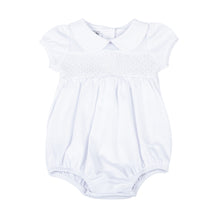 Load image into Gallery viewer, Give your little one a stylish and meaningful look with our Infant Blessed Bubble from Magnolia baby. This adorable bubble features a classic peter pan collar, white smocking, and a cross detail to symbolize blessings. Dress them in comfort and style for any Baptism or religious occasion.

