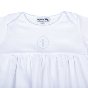 Welcome your little bundle of joy into the world with our Blessed Blue Smocked Boy Gown. Crafted from the softest materials, this gown features a delicate cross stitched in the center of the chest and intricate embroidery on the neckline and sleeves. Perfect for your little prince's first photos, this simple yet elegant design is sure to become a cherished keepsake for years to come.