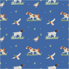 Load image into Gallery viewer, Celebrate your little adventurer with the On the Hunt Romper by Trotter Street Kids. This navy romper showcases charming hunting dog prints, perfect for families who cherish the outdoors. It’s a thoughtful, heartwarming gift that sparks joy and a love for nature from the very start!
